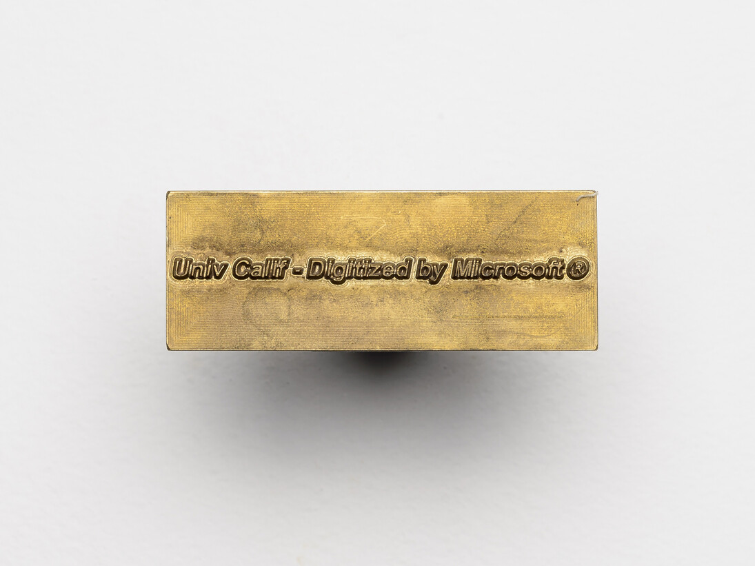 Juan Pablo Macías. Owen (Word+Moist Press Volume II - installation), 2015 1 Digital print on Hahnemülle paper, 1 copper seal, 1 book with metalic chain, + 1 channel video B/W with sound 41'19'' , 9 digital prints on aluminum engraved with pantograph, 5 digital prints.Courtesy of the artists and Proyectosmonclova. Photo: Moritz Bernoully