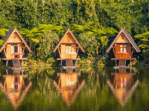In Bandung, Indonesia, Dusun Bambu’s traditional Sundanese architecture stands harmoniously against the lush green landscape, offering a peaceful retreat where nature and culture beautifully intertwine