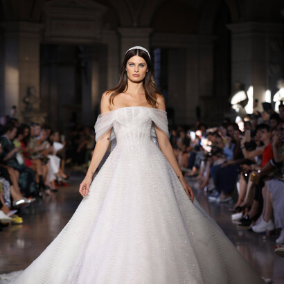 Brazilian supermodel Isabeli Fontana closing the show as the Bride of the Temple of Flora