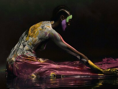 A performer surrounded by flowing fabric and expressive brushstrokes, representing the freedom and spontaneity of human imagination