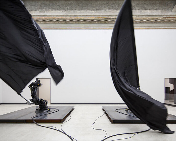 William Forsythe, Black Flags, 2014, readymade industrial robots, nylon flags, carbon fiber flagpoles, and steel plates, dimensions variable © William Forsythe. Photo by David Brandt.