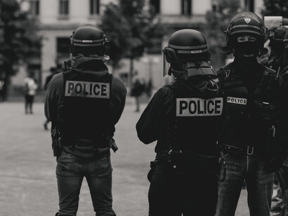 Policemen wearing protective gear