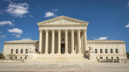 The U.S. Supreme Court building serving as a pillar of justice, reflecting the stability and legitimacy of a well-ordered legal system