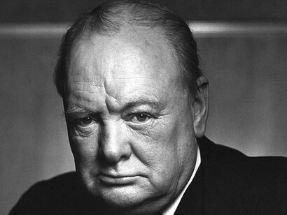 Winston Churchill, former prime minister of the UK, stares into the distance