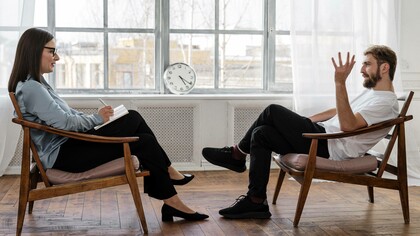 Man discusses his early childhood with therapist