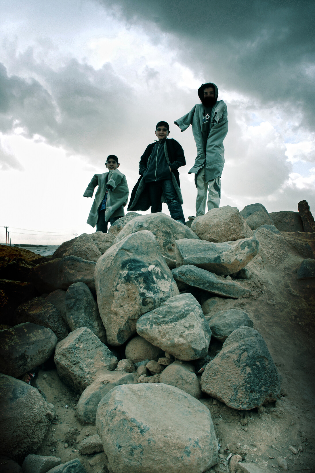 Hermoine Macura, Disabled Refugees, Syria, 18.5” x 12.5”, Photograph on Metallic Paper, Courtesy of Agora Gallery 