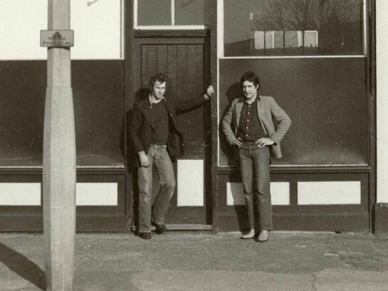 Jonathan Harvey and David Panton outside 117 Devons Road, E3 one of the first two ACME houses and first office. Claire Smith (1974)