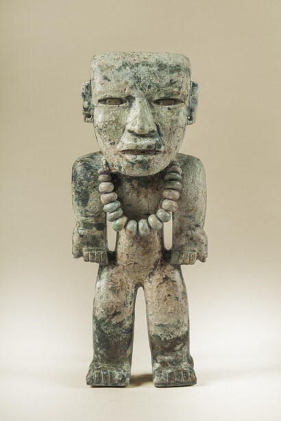 Standing figure, 200–250. Greenstone. Zona de Monumentos Arqueológicos de Teotihuacán / INAH [Proyecto Tlalocan]. Photograph by Jorge Pérez de Lara Elías, © INAH.
