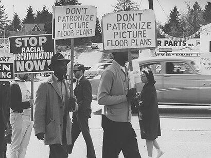 During the pivotal year of 1964, activists in Seattle, Washington, united in a poignant fair housing protest, courageously challenging racial discrimination in real estate transactions and playing a significant role in advancing the Civil Rights Movement's pursuit of equality
