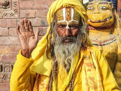 Dressed in simple clothing, often with ash smeared on their bodies, Sadhus embody a life of austerity and devotion, aiming to transcend material existence