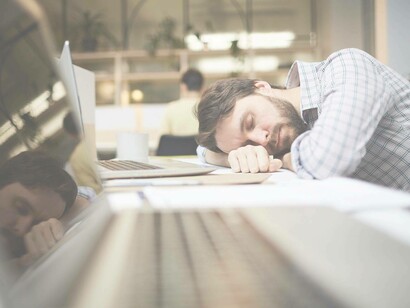A Millennial taking a rest break at work after a tiresome morning but maybe he's not the right staff member to succeed at this company