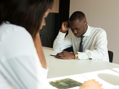 Man lost in thoughts at the workplace 