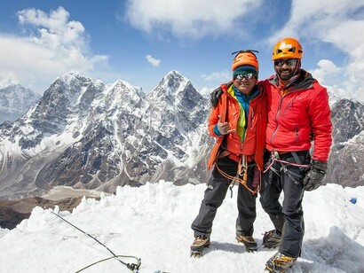 Nepal's iconic mountaineer Ang Tshering Lama guiding a Maldivian mountaineer in Nepal Himalayas