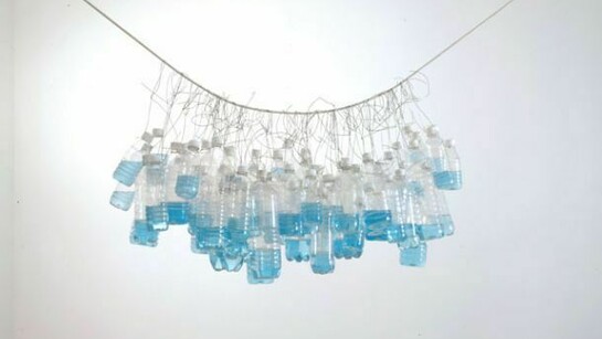 It Seemed a Beautiful Day, 2002, Plastic bottles with plastic caps, water, food dye, wire, rope, Bottles: 23 x 48 x 23 inches (58.4 x 121.9 x 58.4 cm); overall dimensions variable, Collection of the San Francisco Museum of Modern Art. Purchased through the In/Site Fund and the James Wilson Trust in memory of Michael Moran. Photograph by Adam Reich