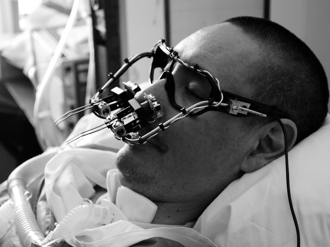 Zach Lieberman (American, b. 1977), James Powderly (American, b. 1976), Evan Roth (American, b. 1978), Chris Sugrue (American, b. 1978), TEMPT1 (American), and Theo Watson (British, b. 1981). EyeWriter. 2009. openFrameworks and custom software, eyeglasses, PlayStation Eye camera, IR pass filter, IR LEDs, battery clip, resistor, zip ties, and metal wire. 7 7/8 x 5 7/8 x 1 15/16″ (20 x 15 x 5 cm). Image by the EyeWriter Team. The Museum of Modern Art, New York. Architecture & Design Purchase Fund, 2011.