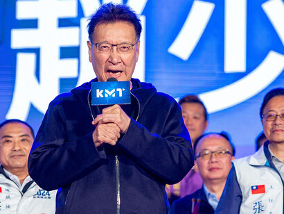 KMT candidate Zhao Shaokang campaigns at a 2024 election rally in Taiwan, addressing key policy issues and party supporters
