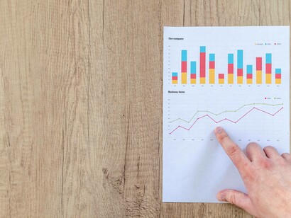 An employee attempting to make sense of the graph that shows the market research