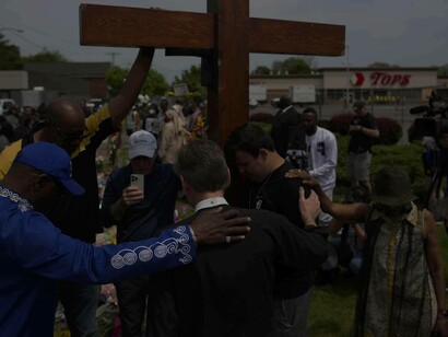 Americans of all races coming together to say their respects for those who lost their lives in the Buffalo targeted shooting