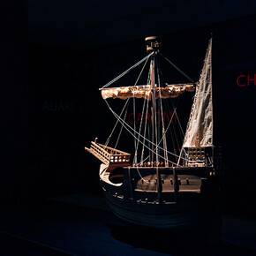 Lothar Baumgarten, Los Aristócratas de la Selva y la Reina de Castilla, 2011-2012, 4 ship models, (C. Columbus) Santa María, Pinta, Niña, Coca de Mataró, Wall drawing of 250 South American river names, 3.5 hour sound piece, looped + 
6 films, color and black/white, sound (Yãnomãmi) (108 min.). Dimensions variable