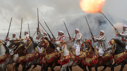Moroccan horsemen perform during the seventh edition of the “Salon du Cheval” in the port city of El Jadida, Morocco