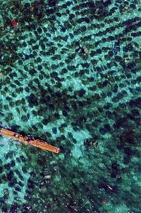 Aerial view of boat in Bolinao, Pangasinan, Philippines
