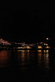 Portovenere and its thousand lights shining at night