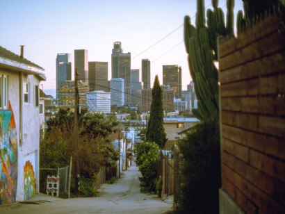 Narrow alley and skyscrapers behind in Los Angeles, USA
