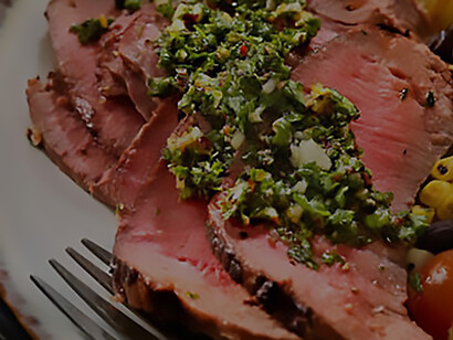 The exquisite taste of a medium-rare Argentinian steak paired with the zesty goodness of Chimichurri sauce