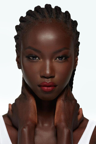 Anok Yai: one of the models appearing on the February 2022 cover of British Vogue with darkened skin