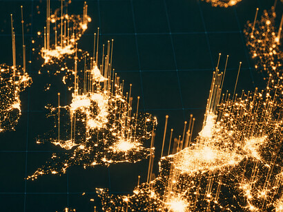 A global satellite communications network illuminates Earth at night, highlighting the interconnected infrastructure that enables modern digital communication
