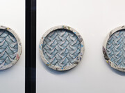 Sam Porritt, A Matter of Perspective (Triptych), 2018. Brush, ink and wax crayon on paper. Card, plaster, papier-mâché. Frame. 82 cm (diameter) x 7.5 cm each.

