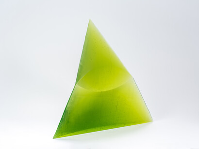 Stanislav Libensky & Jaroslava Brychtova, Green Eye of the Pyramid, 1993-2007, Cast, cut, and polished glass, 34.5 x 40 x 10 in. Courtesy of LewAllen Galleries