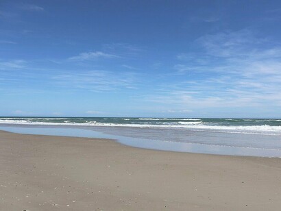 Emerald Isle captures the magic of North Carolina’s coast with its wide sands and crystal-clear waves