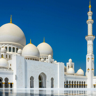 The Sheikh Zayed Grand Mosque is famous for its breathtaking Islamic architecture that blends styles from Mughal, Persian, Moorish, and Ottoman traditions