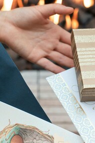 A small thank-you present exchanged between two people, symbolizing appreciation made visible and heartfelt