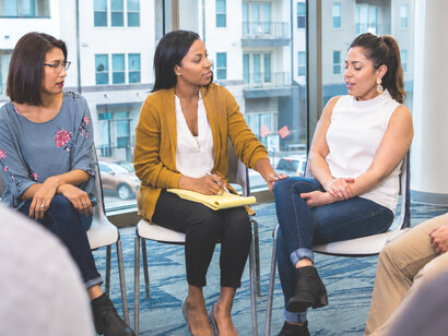 A multicultural group participating in an open and respectful dialogue