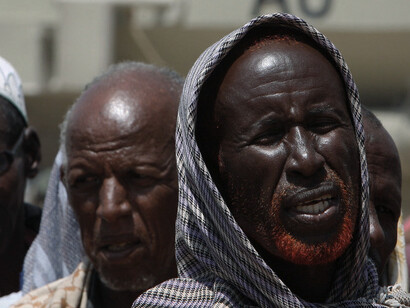 With henna-dyed beards, these Somali elders continue a revered tradition, embodying the wisdom of proverbs that have shaped their community for generations