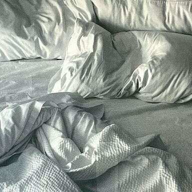 Luanne Rimel, Absence / Presence,
photograph printed on silk, hand-stitched with cotton embroidery thread,
23" x 23",
2024. Courtesy of the artist and Duane Reed Gallery