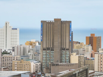 Dazzling skyline of Durban, KwaZulu-Natal, South Africa, showcasing towering high-rise buildings, emblematic of urbanization in the area