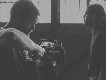 The skilled cameraman handled the movie recording with precision and expertise