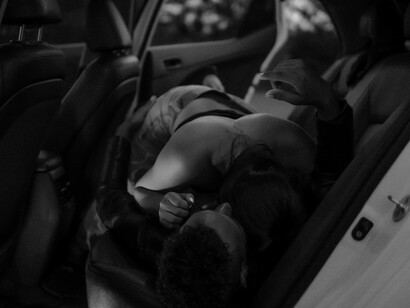 A couple lost in passion, illustrating the messy, real side of romance rarely shown onscreen
