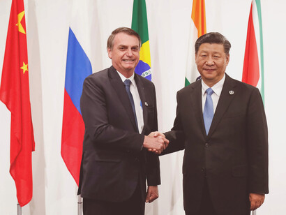 Jair Bolsonaro, presidente de Brasil, y Xi Jinping, presidente de China, se reúnen durante la vista del mandatario brasileño a la Shanghái en 2019