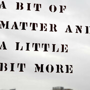 Lawrence Weiner: A bit of matter and a little bit more
Originally part of the exhibition Rooms in 1976, Lawrence Weiner wrote the title phrase on the inside of the front entrance as well as on the outside of the back door of MoMA PS1. The original doors, made of wood and metal, were removed during the renovation in 1997. After the renovation was completed, the artist was invited back to recreate the piece on both sides of the glass windows of the front doors.

Lawrence Weiner. A bit of matter and a little bit more. 1976. © 2017 Lawrence Weiner. Photo: Matthew Septimus
