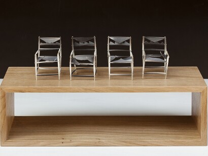 May Cornet, 'Feather Chairs', 2014, feathers and pins, 8 × 5 × 5 cm on oak plinth