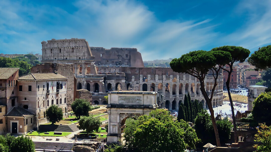 The Colosseum and Arch of Titus in Rome, Italy