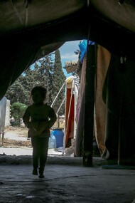 Child in a temporary shelter