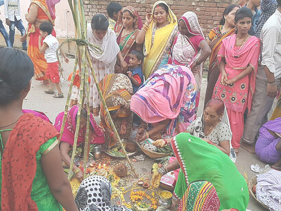 The festival is marked by prayers, rituals by the riverside, and the sharing of blessings among women, symbolizing maternal love, faith, and resilience