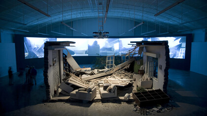 Zhang Peili, A Gust of Wind (Zeng feng) (2008). Five-Channel/five-screen video projection (PAL), silent/colour, 13’14” with objects preserved from the film set destroyed during shooting, dimensions variable. © Boers-Li Gallery, Beijing. Courtesy of the artist and Boers-Li Gallery