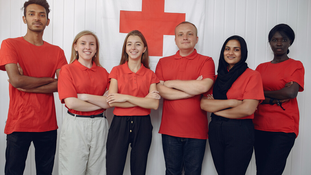 Physicians from diverse cultural backgrounds trained in different medical traditions, working together to provide inclusive and culturally competent care