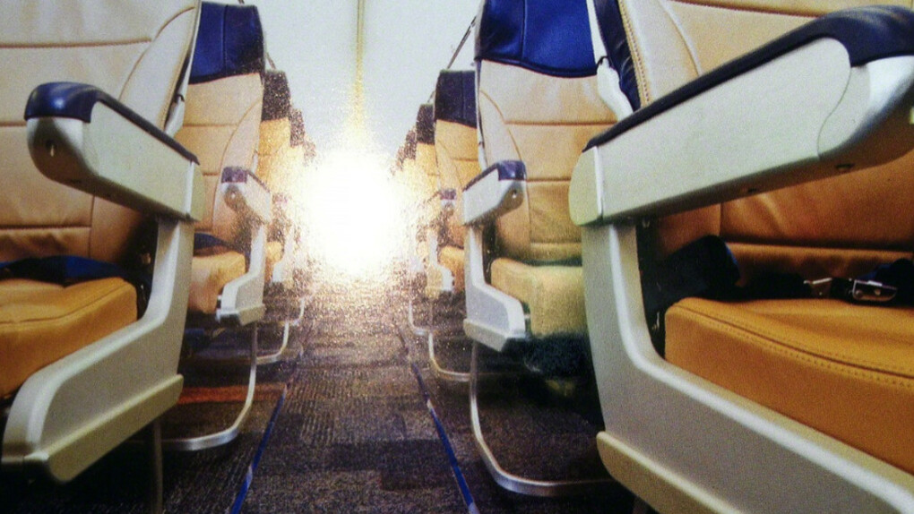 Nina Katchadourian, Spectre, 2012 (“Seat Assignment” project, 2010-ongoing), C-Print, 19h x 24w in. Courtesy of the artist, Catharine Clark Gallery, and Fridman Gallery.
